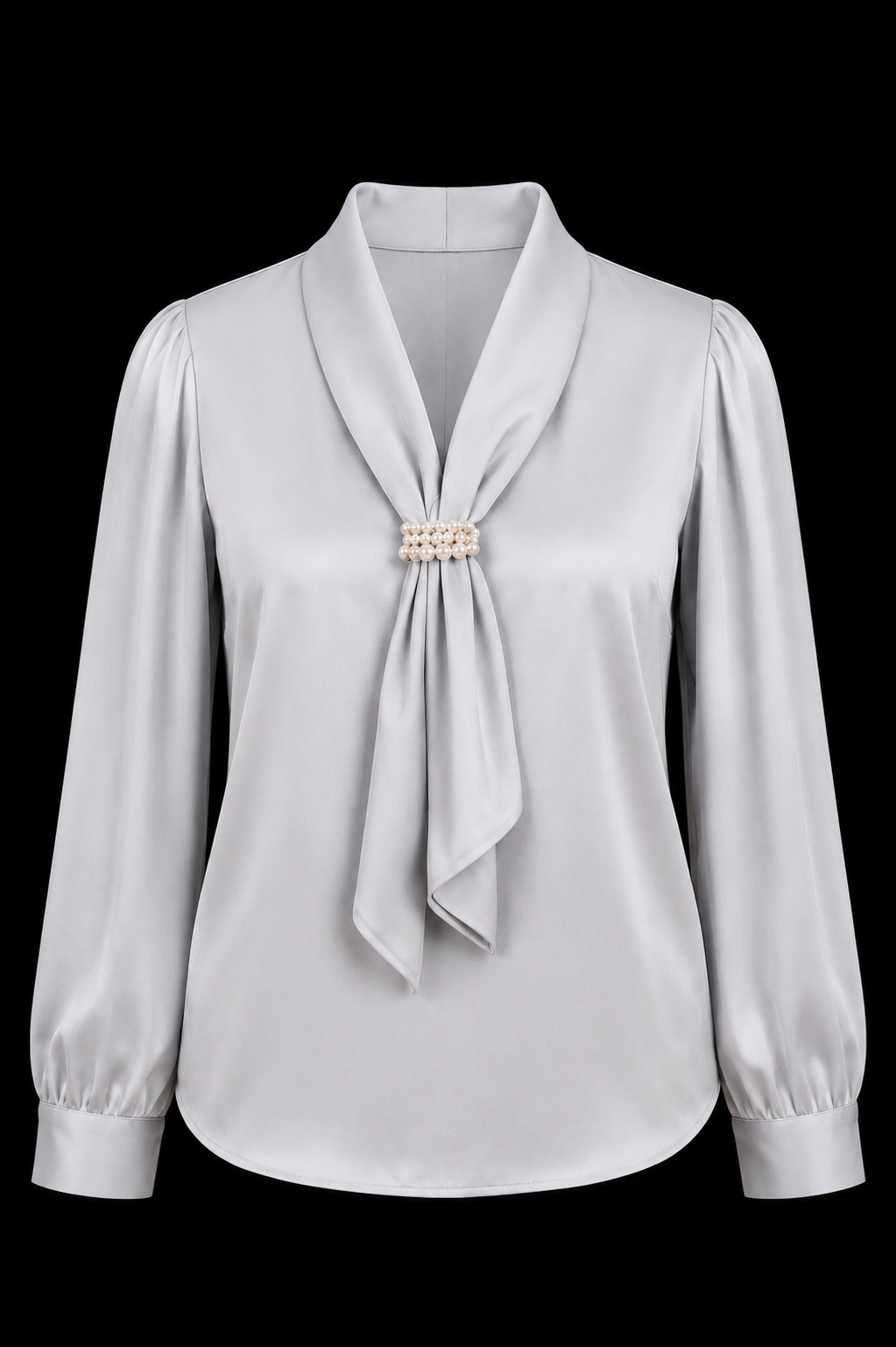 Light gray blouse with a decorative brooch on a black background