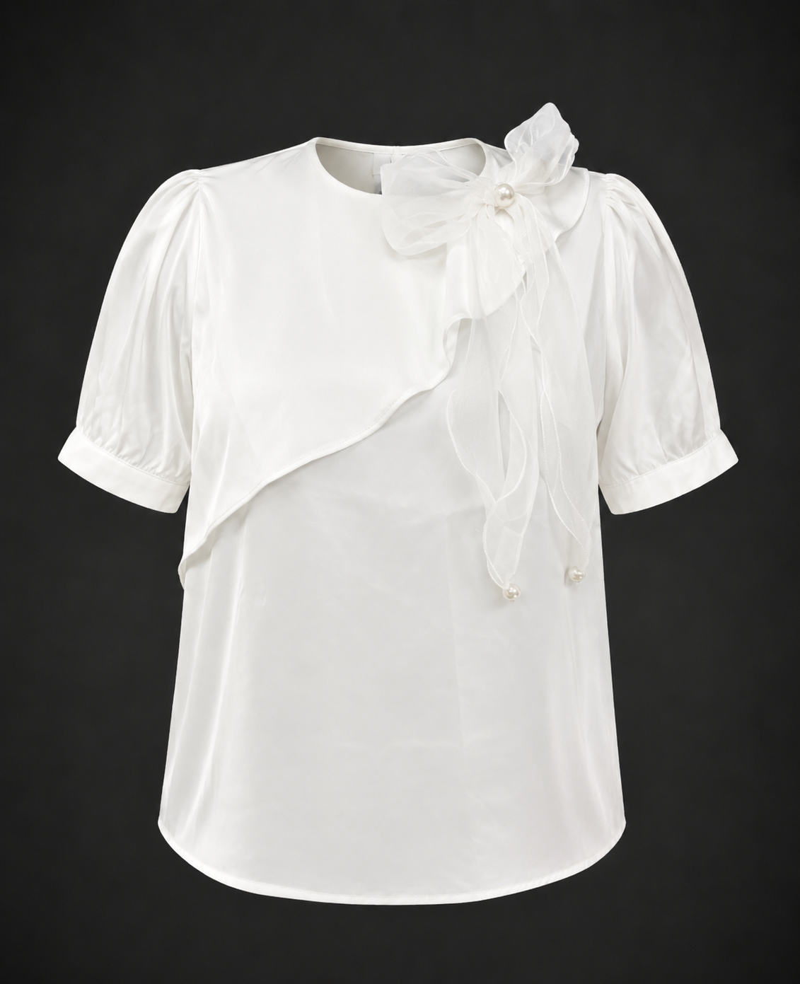 White blouse with floral details on a black background