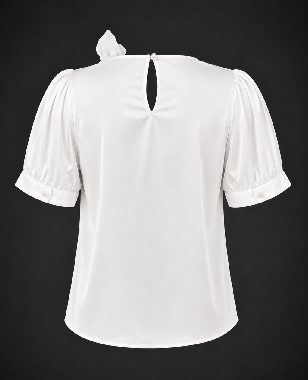 White blouse with puff sleeves on a black background