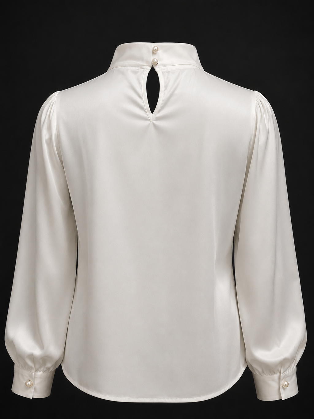 White blouse with long sleeves on a black background