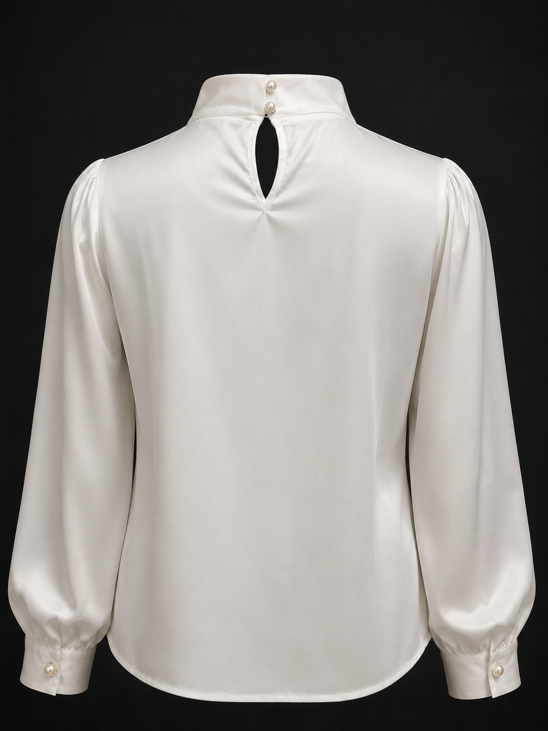 White blouse with long sleeves on a black background