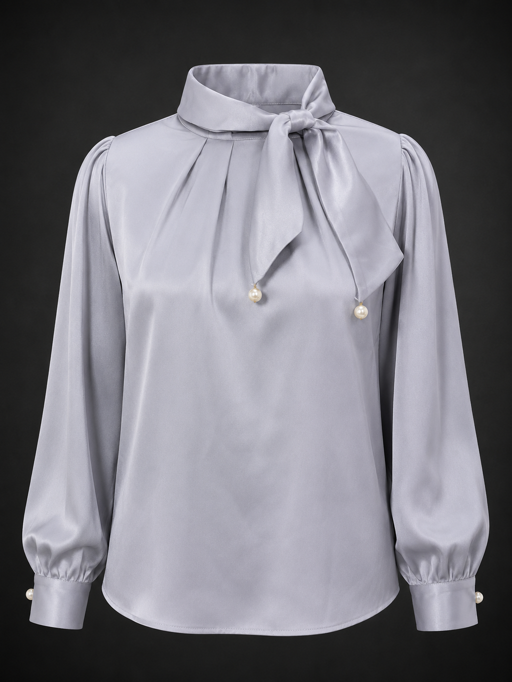 Light gray blouse with a bow neckline on a black background