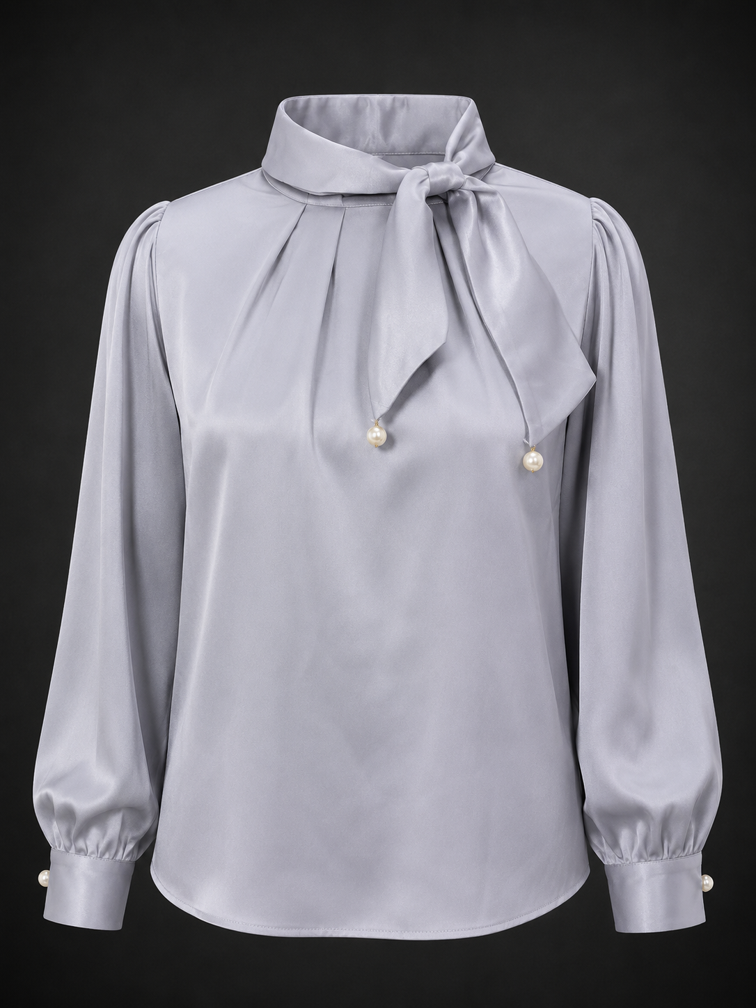 Light gray blouse with a bow neckline on a black background