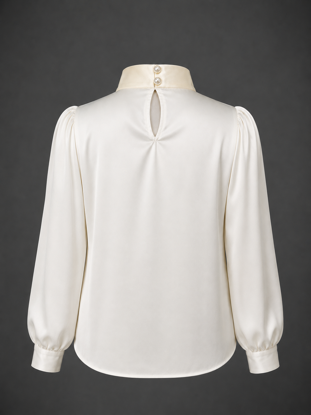 White blouse with long sleeves on a dark background