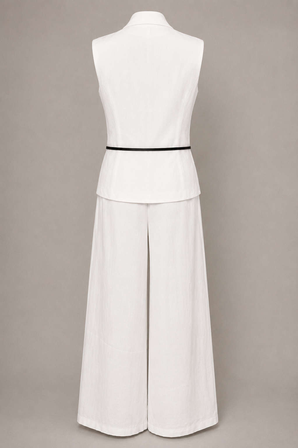 White sleeveless top and wide-leg pants on a mannequin against a beige background