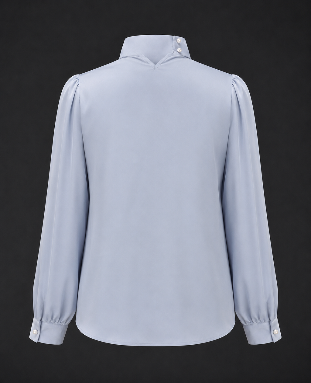 Light blue blouse with long sleeves on a black background