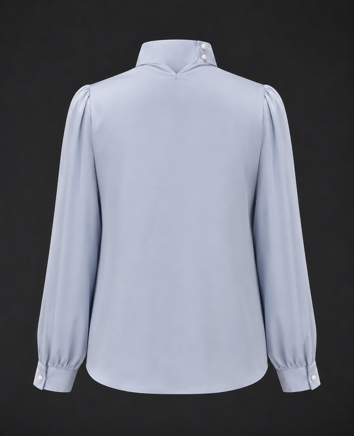 Light blue blouse with long sleeves on a black background