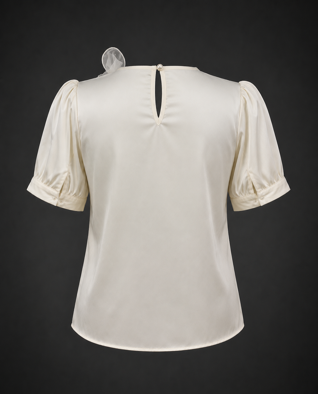 White blouse with puff sleeves on a dark background