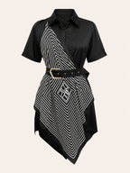 Black dress with white geometric pattern on a beige background