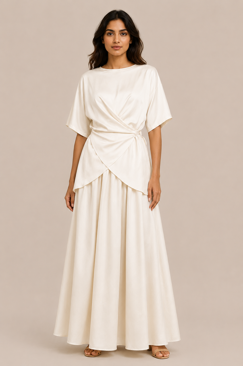 Woman wearing a white dress against a beige background