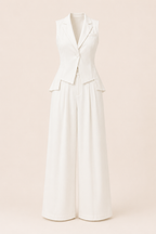 White jumpsuit on a light pink background