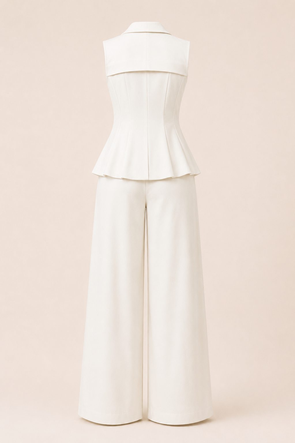 White peplum top and wide-leg pants on a beige background