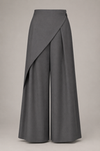 Gray wide-leg pants with a draped front panel on a beige background