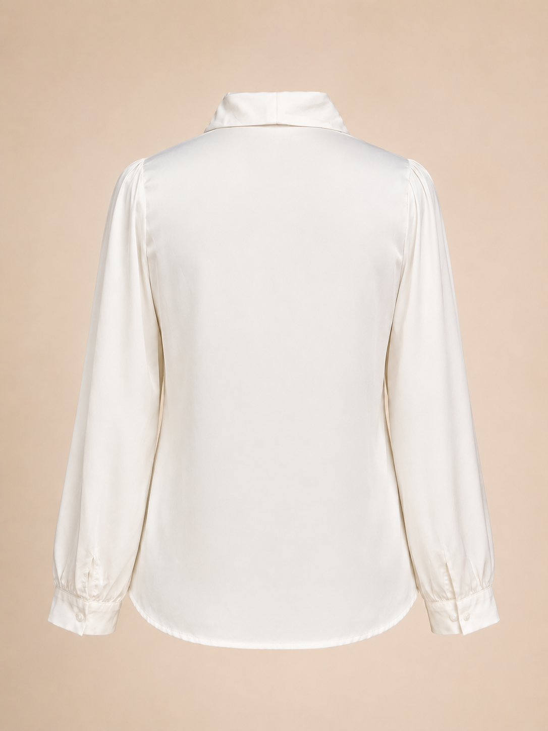 White blouse on a beige background
