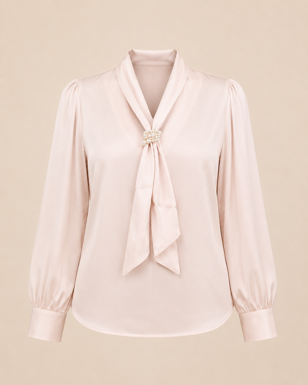 Light pink blouse with a tie detail on a beige background