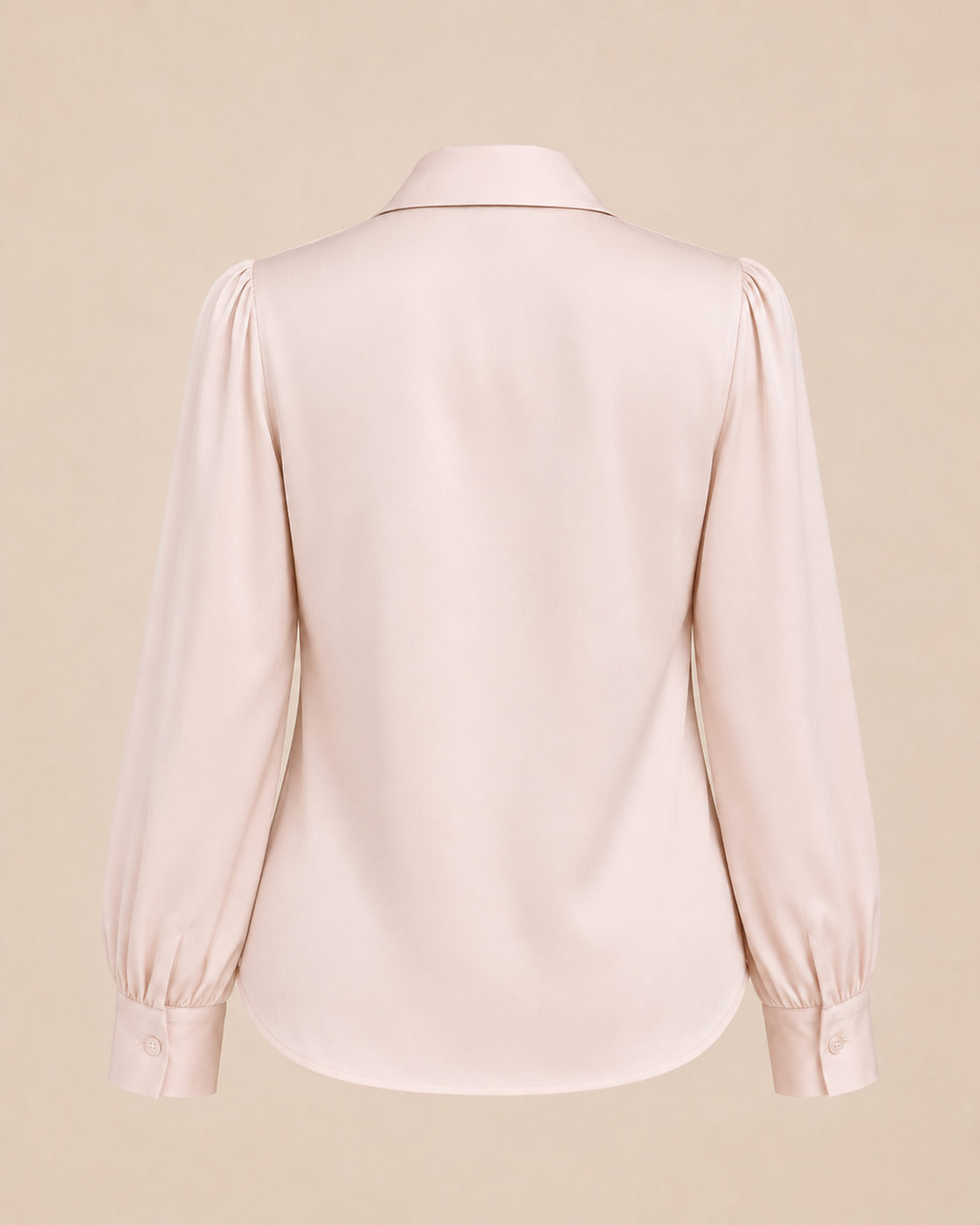 Light pink blouse on a beige background